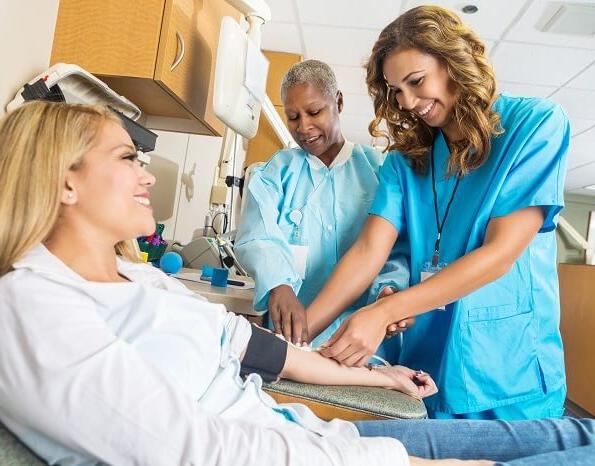 Nursing Student with Nurse Educator in School