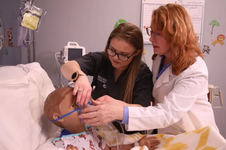 Student Participating in LPN to BSN Program Simulation Lab